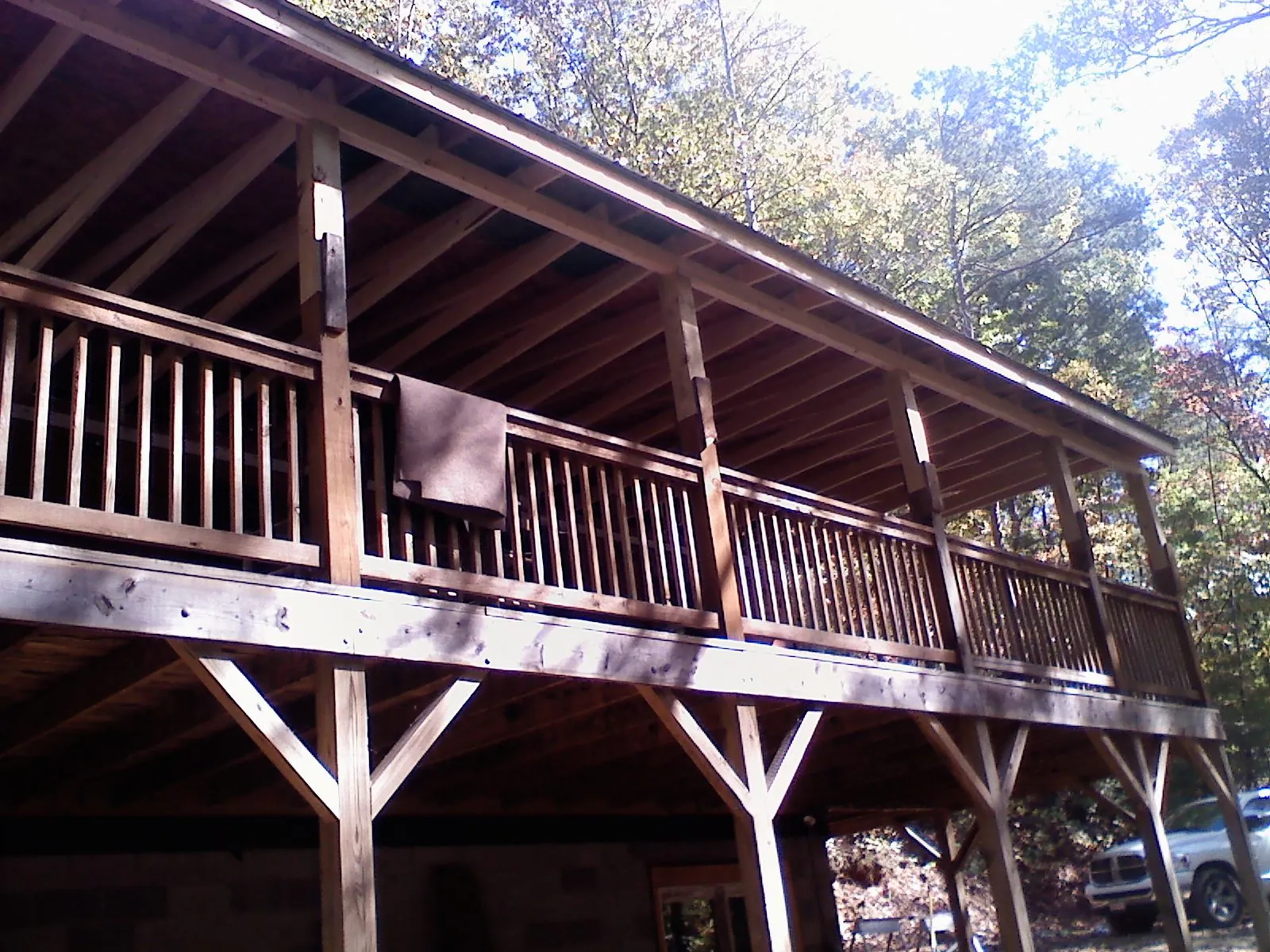 Timber framing under a new elevated porch and deck — Roof Leak Repair in Brimfield by Roofing Brothers